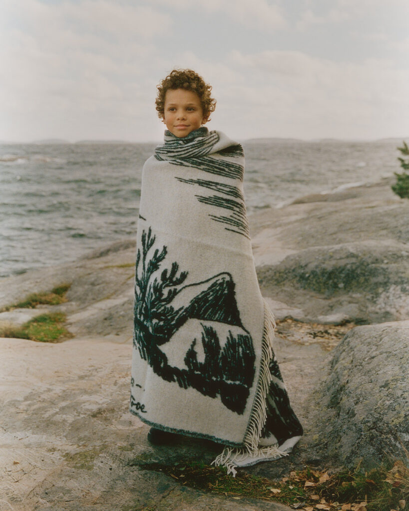 Arket Moomin Tove Jansson collaboration boy with blanket