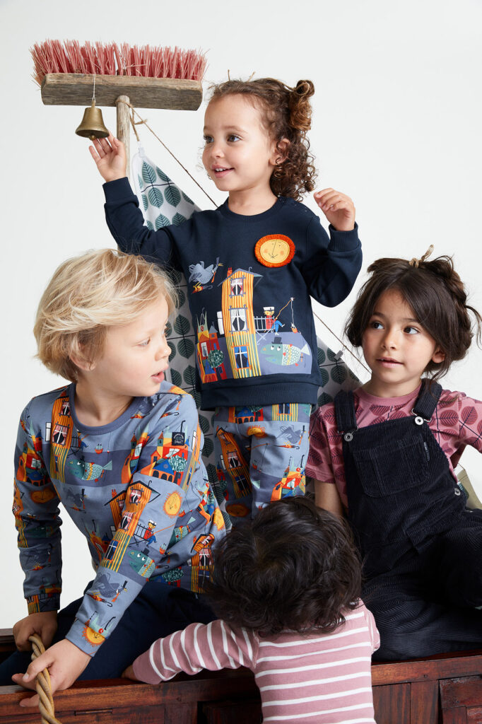 Four children in PO.P Stig Lindberg clothing